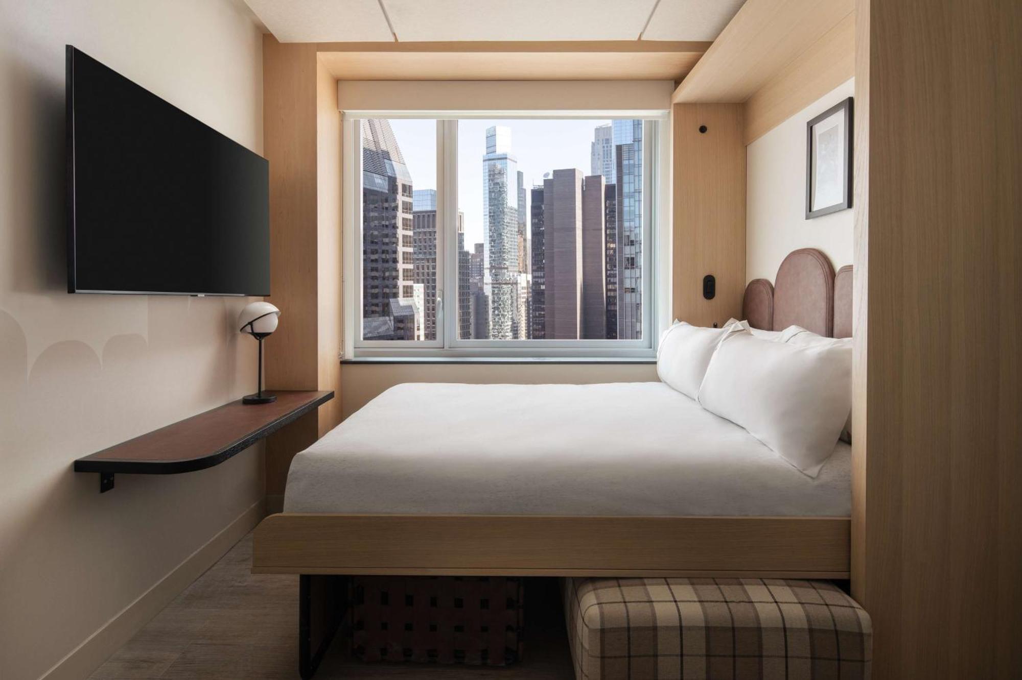 Compact Queen Room City View Communication Assistance