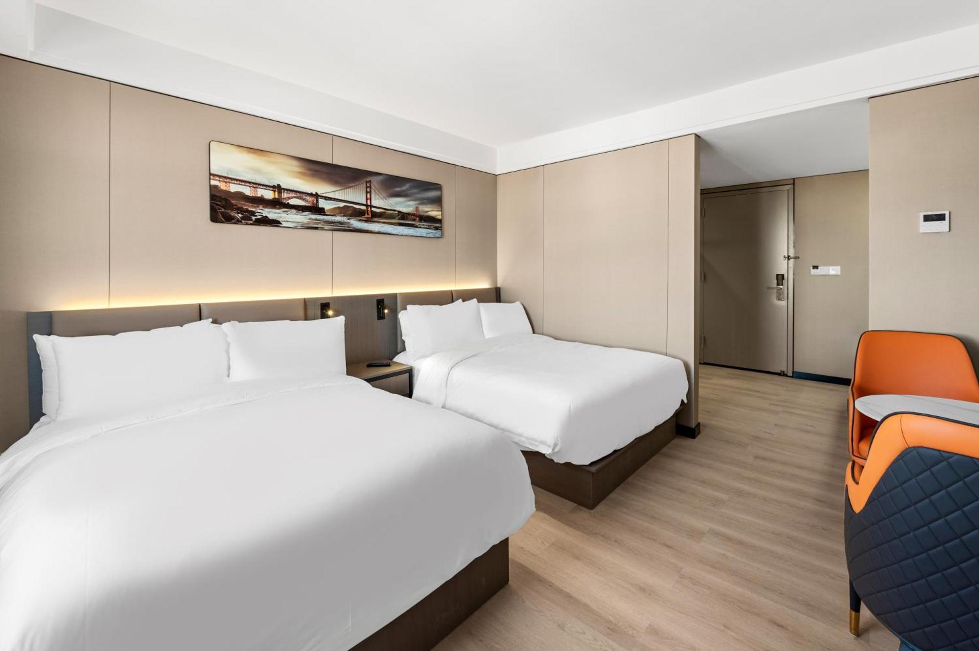 Chambre Double Deluxe (1 Adulte + 1 Enfant)