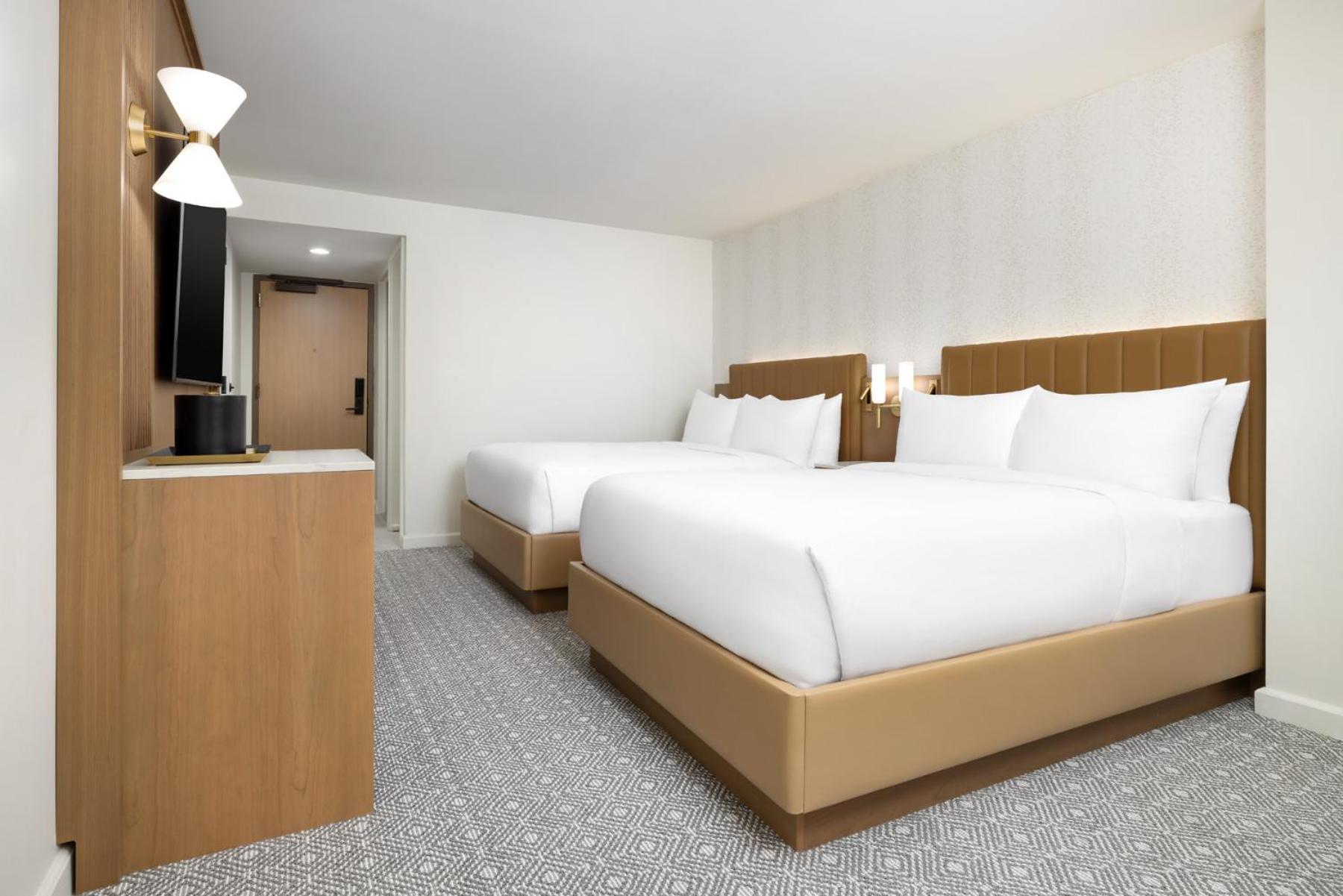 Corner Room Two Double Beds Tub Accessible